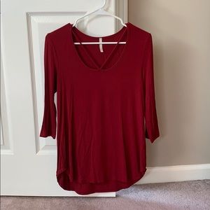 red top with neck detail